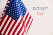 American flags and text patriot day