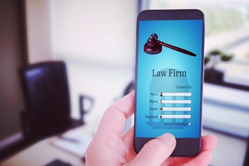 Poster - Composite image of female hand holding a smartphone