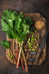 Canvas Print - fresh organic rhubarb on wooden cutting board