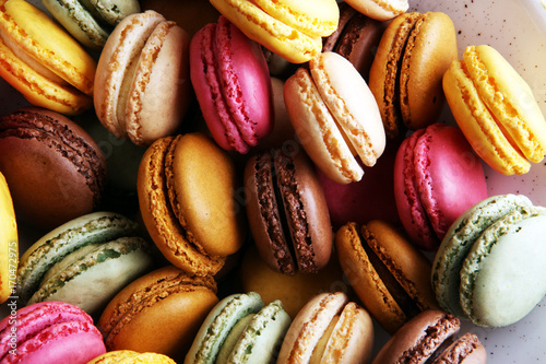 Fotografía Sweet and colourful french macaroons or macaron on white background, Dessert