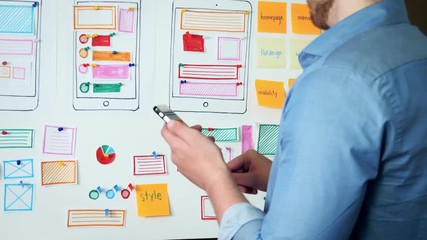 Creative UX designer doing usability research for mobile application