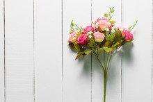 Bouquet Pink Roses On A White Wooden Table,valentine Background,top View.
