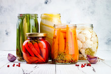 Marinated Pickles Variety Preserving Jars. Homemade Green Beans, Squash, Cauliflower, Carrots, Red Chili Peppers Pickles. Fermented Food.