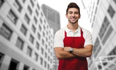 Poster - Composite image of portrait of confident male owner with arms