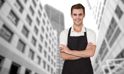 Poster - Composite image of portrait of young man with arms crossed