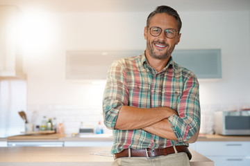 Sticker - Cheerful mature man with eyeglasses looking at camera