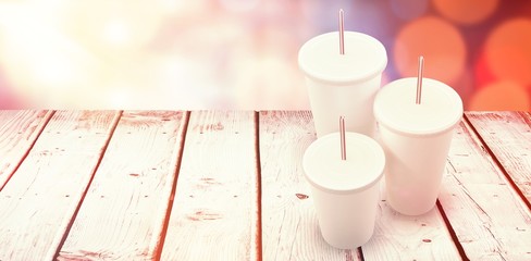 Poster - Composite image of white cups over white background