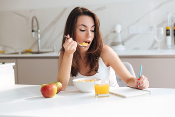 Sticker - Casual young woman eating corn flakes cereal for breakfast