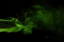 Green Colored Smoke On A Black Background, Abstract Cloud. Smoke Design,Abstract Green Lighting,Green Smoke