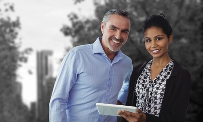 Poster - Composite image of business people looking at camera 