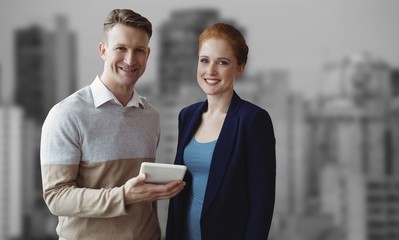 Poster - Composite image of  smiling business people using a digital