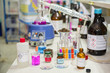 © Prajakkit - Scientists are investigating the acidity of a chemical by litmus paper in a chemistry lab.