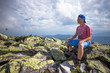 © lkoimages - Happy hiker enjoy beautiful mountains. Relax summer time