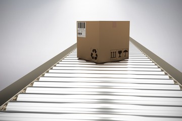 Poster - Composite image of packed parcel box on conveyor belt