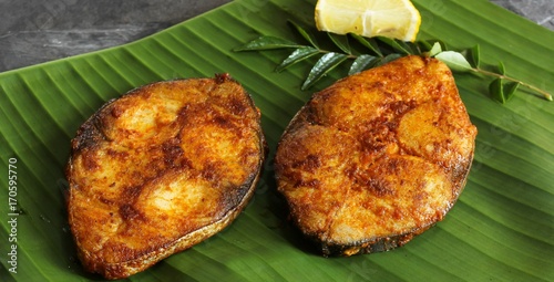 Fotografie, Obraz King Fish fry on banana leaf, selective focus