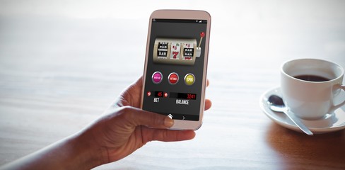 Poster - Composite image of slot machine with text on mobile display