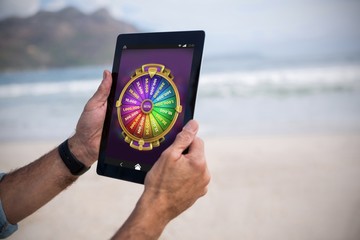 Poster - Composite image of multi colored fortune of wheel on mobile