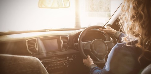 Poster - Woman test driving at showroom