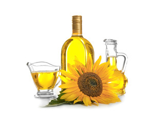 Wall Mural - Composition with cooking oil and sunflower on white background