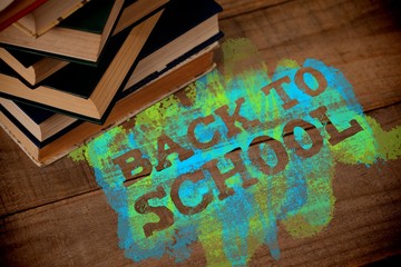 Poster - Composite image of back to school text on green and blue splash