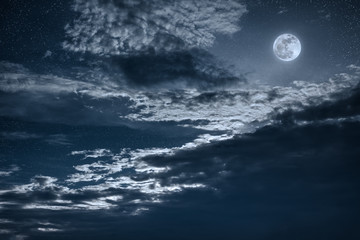 Wall Mural - night sky with bright full moon and dark cloud, serenity nature background.