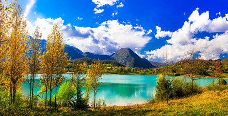 beautiful autumn landscape with turquoise lake lago di castel san vincenzo in molise, italy