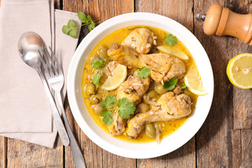 Wall Mural - chicken leg cooked with lemon,coriander and olive