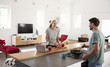© Monkey Business - Couple Preparing Meal Together In Modern Kitchen