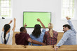 © Monkey Business - Group Of Young Friends Watching Sports On Television And Cheering