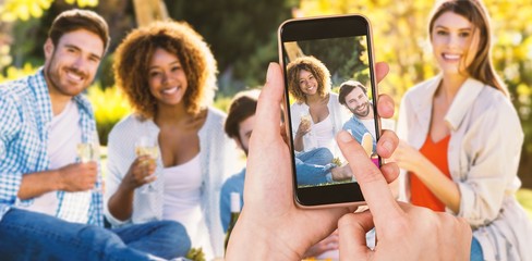 Poster - Composite image of hands touching smart phone