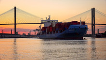 Commercial Container / Cargo Ship On Savannah River At Sunset