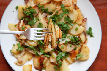 Wall Mural - Fried potatoes with bacon and parsley V