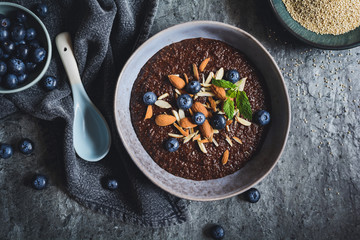 Wall Mural - Chocolate Quinoa porridge with almonds and blueberry