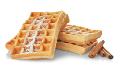 Sticker - Tasty homemade waffles with sugar powder and cinnamon sticks on white background