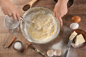 Sticker - Woman making dough for vanilla cake in kitchen