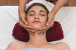 © kaew6566 - concept relaxation and healthy spa. Beautiful young woman getting spa face massage. facial beauty treatment in spa salon.