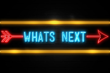 Wall Mural - Whats Next  - fluorescent Neon Sign on brickwall Front view