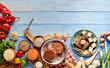 Rustic vegetarian food assortment on timber table