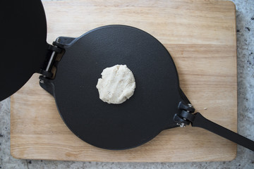 Dough on Tortilla Press