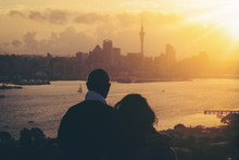 Happy Senior Couple Watching Sunset In Auckland