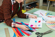 © PR Image Factory - clothing manufacturer company female employee