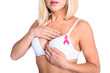 © LIGHTFIELD STUDIOS - woman in bra with pink ribbon
