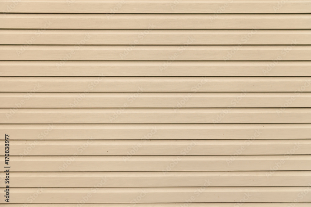 Image showcasing Light brown (beige) vinyl wooden siding panel background with imitation ...