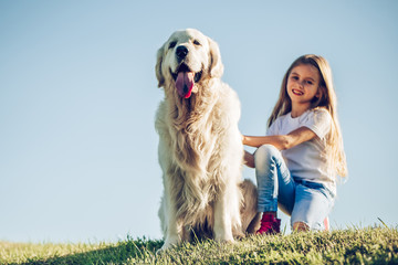 Wall Mural - Little cute girl with dog