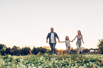 Wall Mural - Happy family outdoors