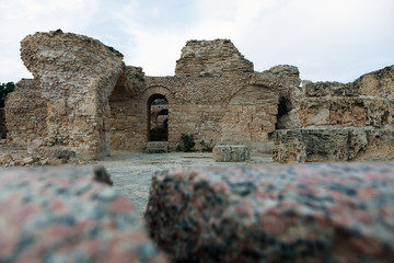 Ruins of ancient Roman baths near city of Carthage Tunisia