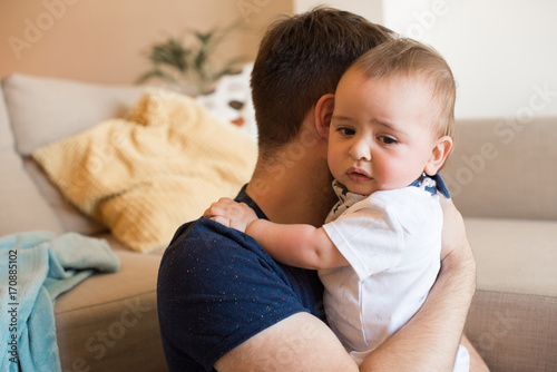 Father Comforting Crying Baby Buy This Stock Photo And Explore