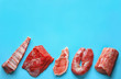 © Africa Studio - Pieces of different fresh meat on color background