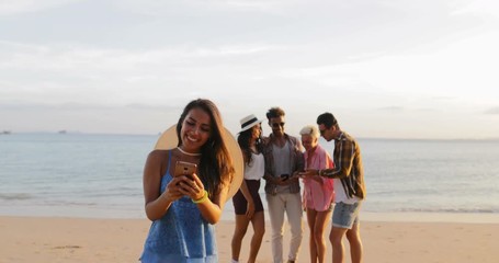 Sticker - Girl Use Cell Smart Phone Welcome People Group To Take Selfie Photo On Beach, Happy Smiling Man And Woman Friends Slow Motion 60