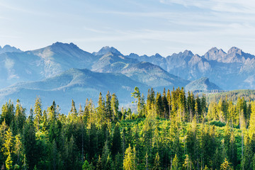 Wall Mural - Fantastic snow-capped mountains in the beautiful cumulus clouds